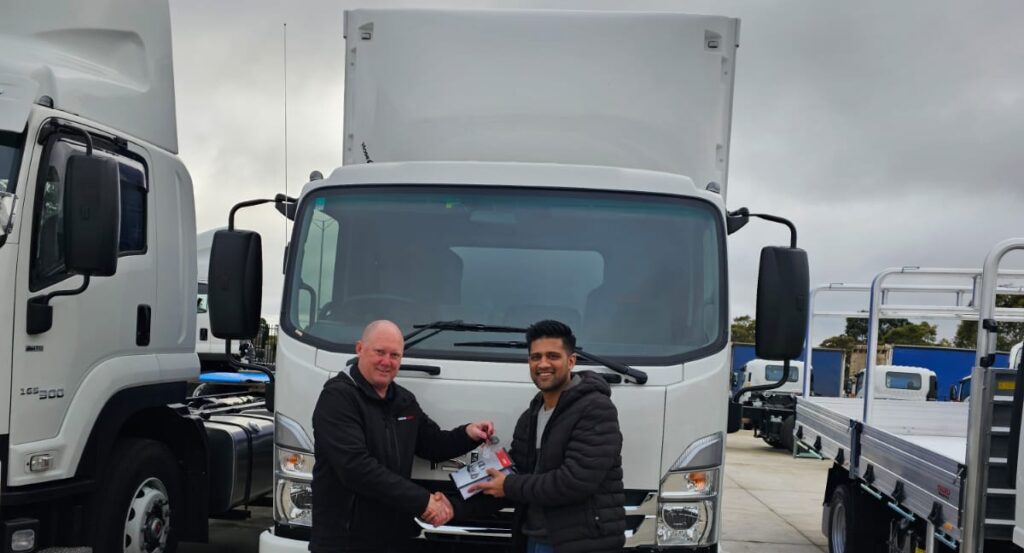 llustration of a handing over brand new isuzu tautliner truck